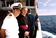 S.E.Mons. Alberto Maria Careggio, Vescovo di Chiavari e il Capitano di Vascello Alberto Venzi, comandante della scuola telecomunicazioni FFAA di Chiavari. sul peschereccio.