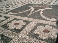 Il simbolo della Madonna Regina del Rosario